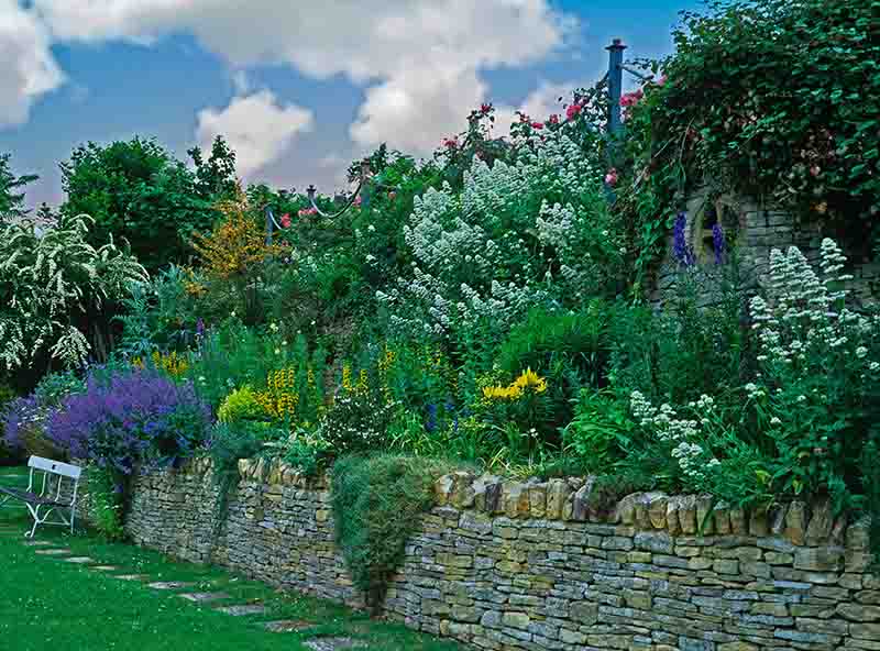 raised boulder flowerbeds and stone planting areas in Kendal